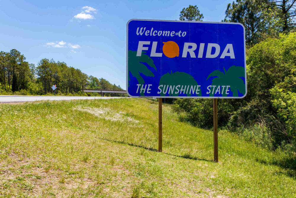 A welcome sign to the Sunshine State