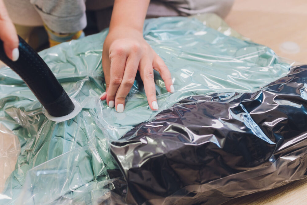 A woman using a vacuum-sealed bag